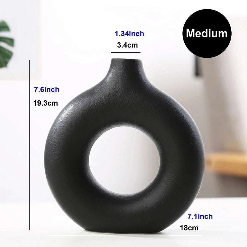 Small and medium Nordic donut vases styled together on a floating wall shelf
