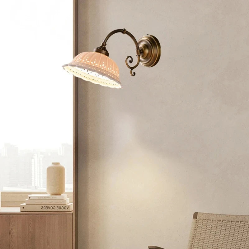 brass wall sconce, installed in a room interior setting