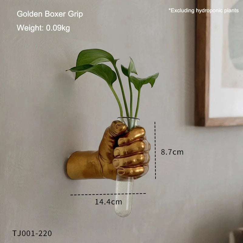 Close-up of resin texture on boxer fist grip wall vase showing knuckle detail