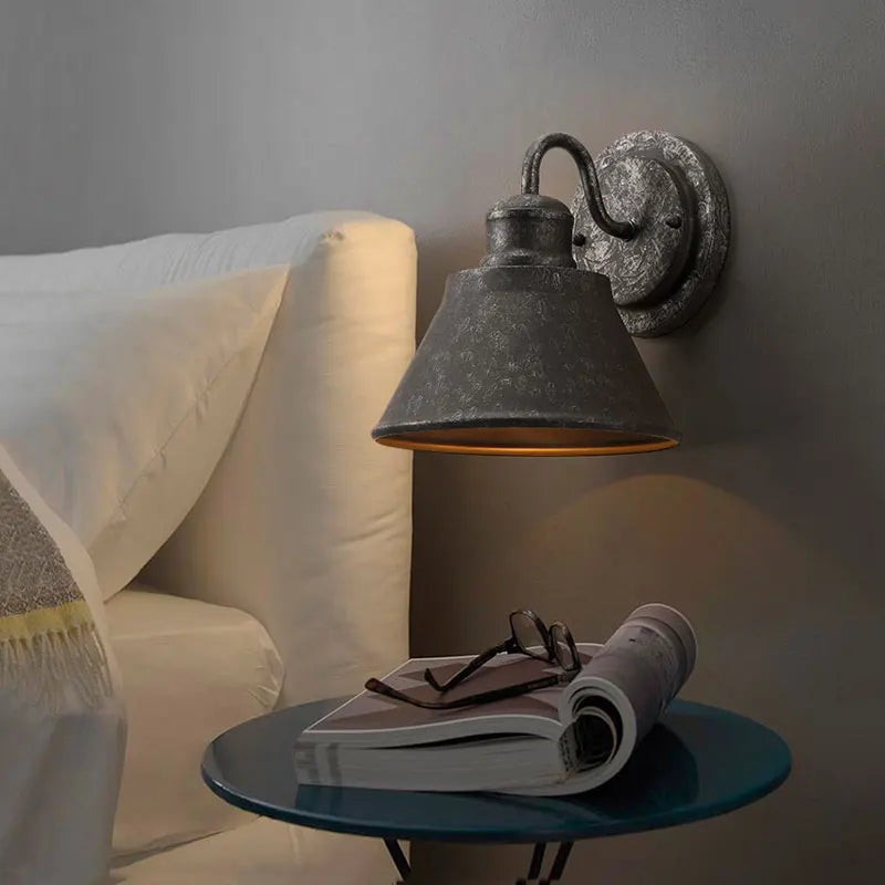 iron outdoor wall sconce, close-up of shade and hardware detail