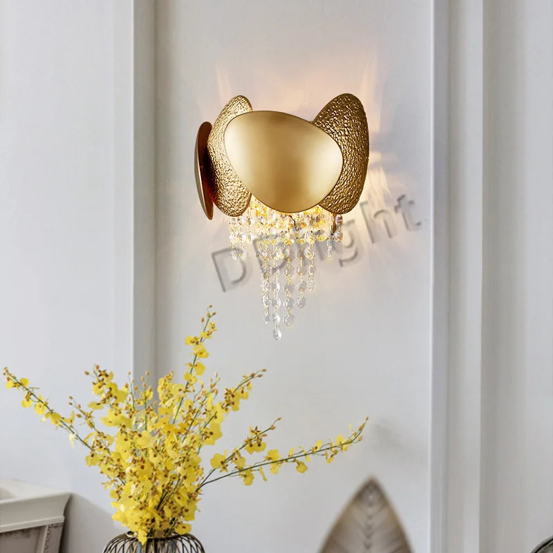Gold stainless steel chandelier with vertical crystal tassel strands