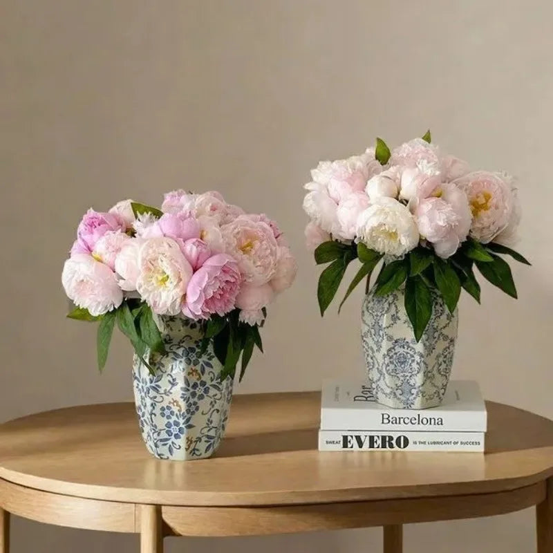 Blue and white chinoiserie porcelain vase displayed in classic interior