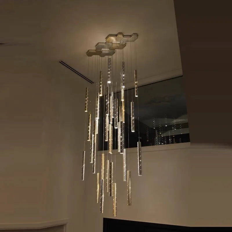 Mixed gold and silver tube chandelier with open ended plated metal tubes