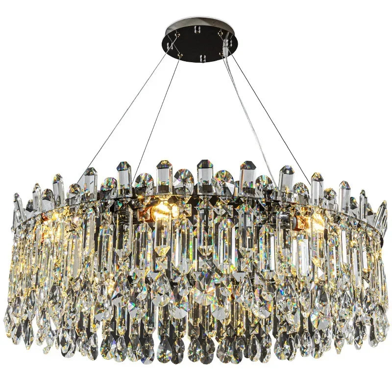 Chrome oval crystal chandelier, 33.5 inches long, above a dining table