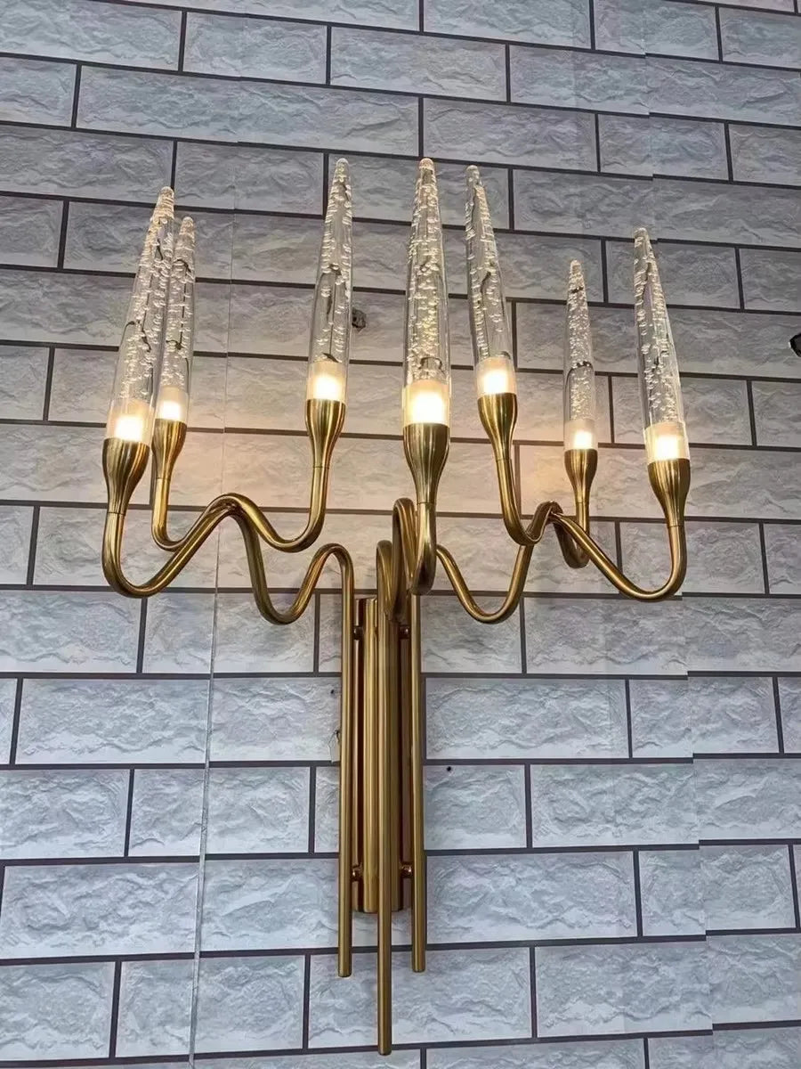 Crystal shade detail on an electroplated iron branch chandelier