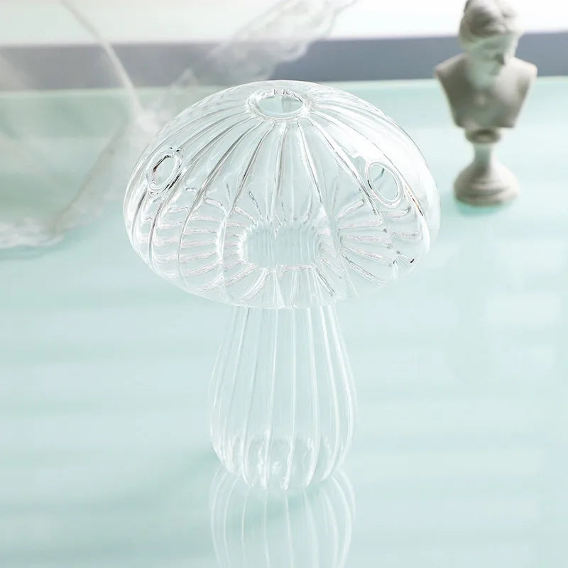 Close-up of mushroom cap detail on small glass hydroponic vase