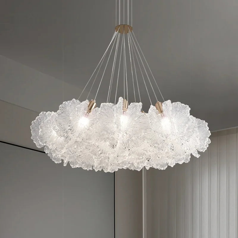 Engraved acrylic petal detail on an art deco nickel chandelier frame
