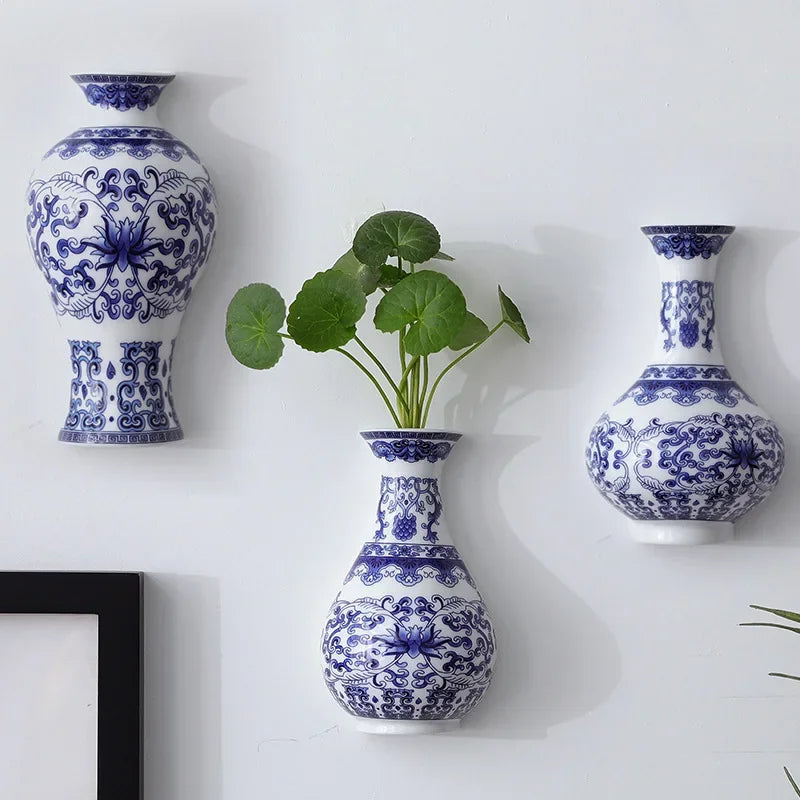 Antique blue and white porcelain wall hanging vase with floral motif