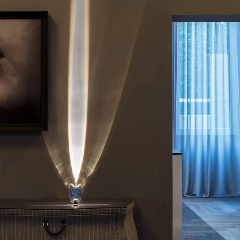 Crystal sky eye lamp in warm white mode placed on bedroom shelf