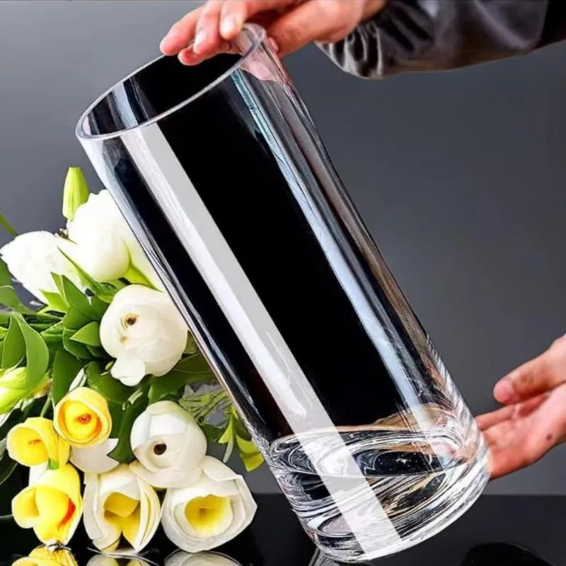 Large acrylic cylinder vase with tall stems living room
