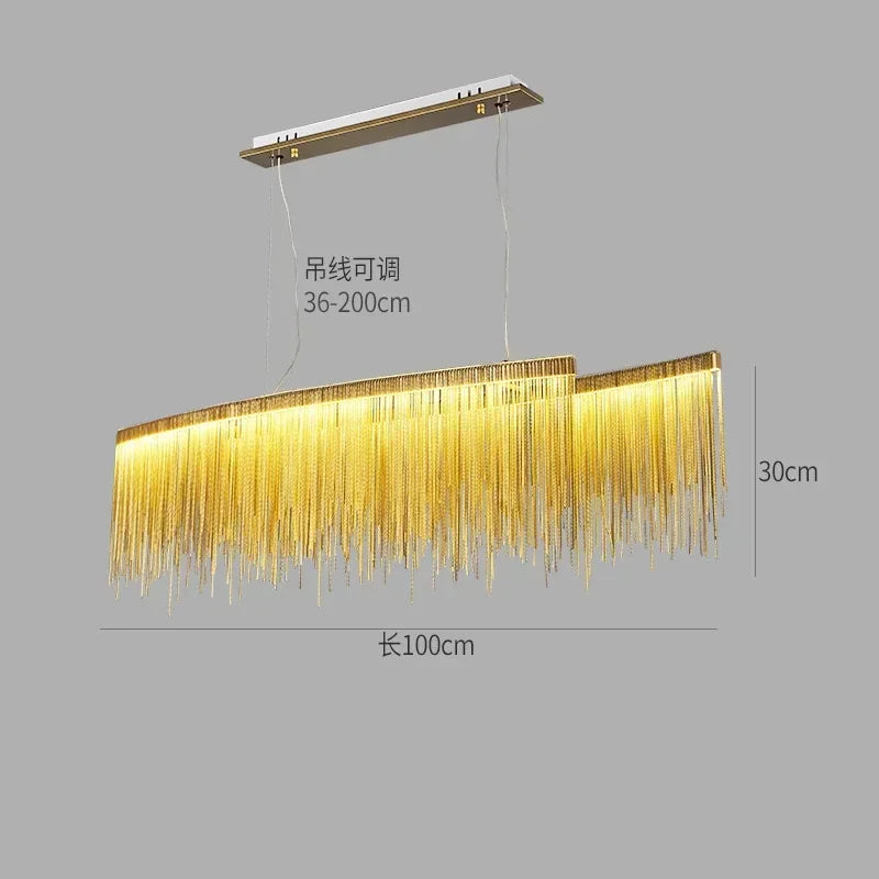 Chain chandelier seen from below with light passing through the tassels