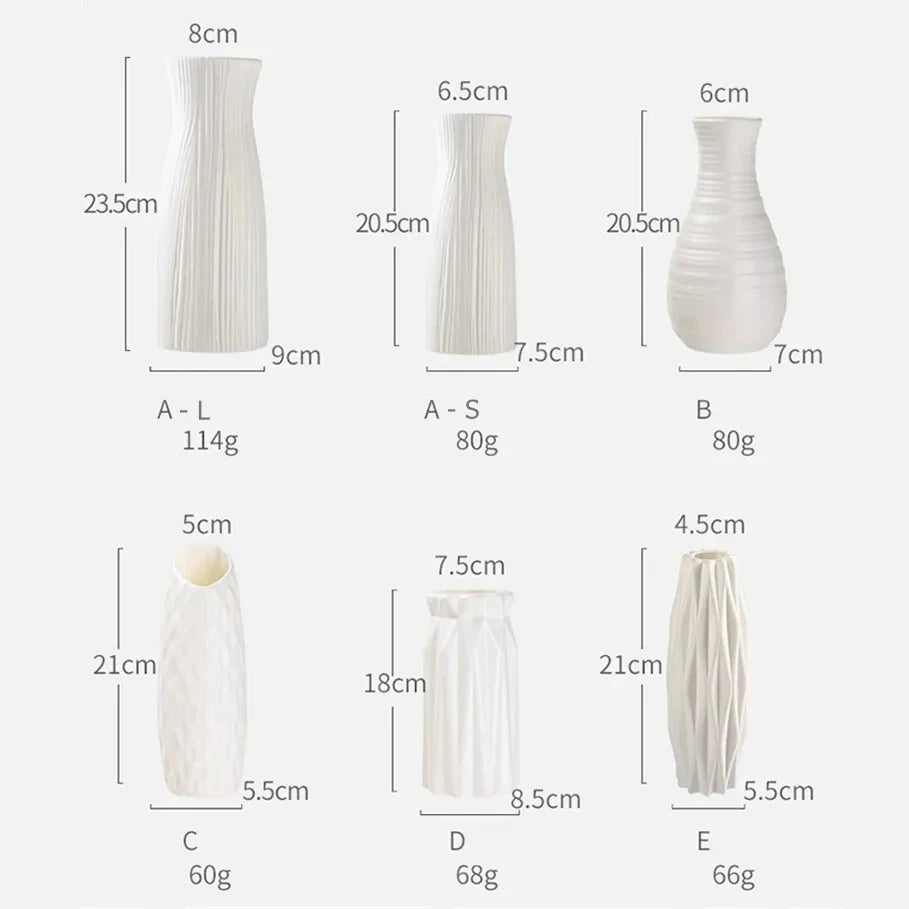 Compact white plastic flower vase for desktop display in modern interior setting