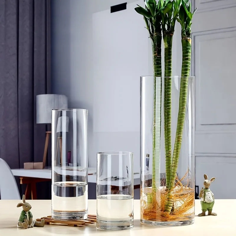 Small clear acrylic flower vase on office desk display