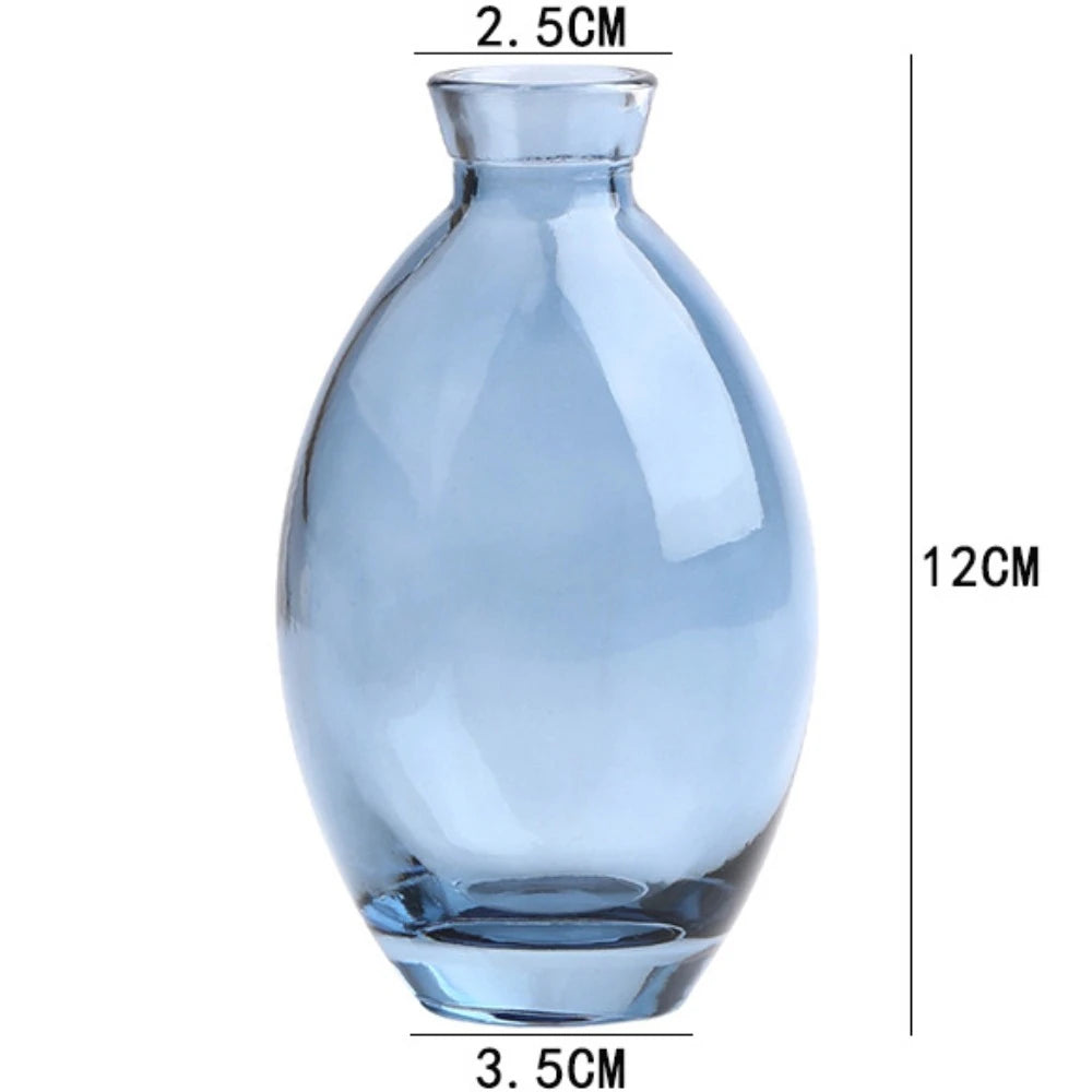 Mini glass flower vase collection in transparent and blue colorways