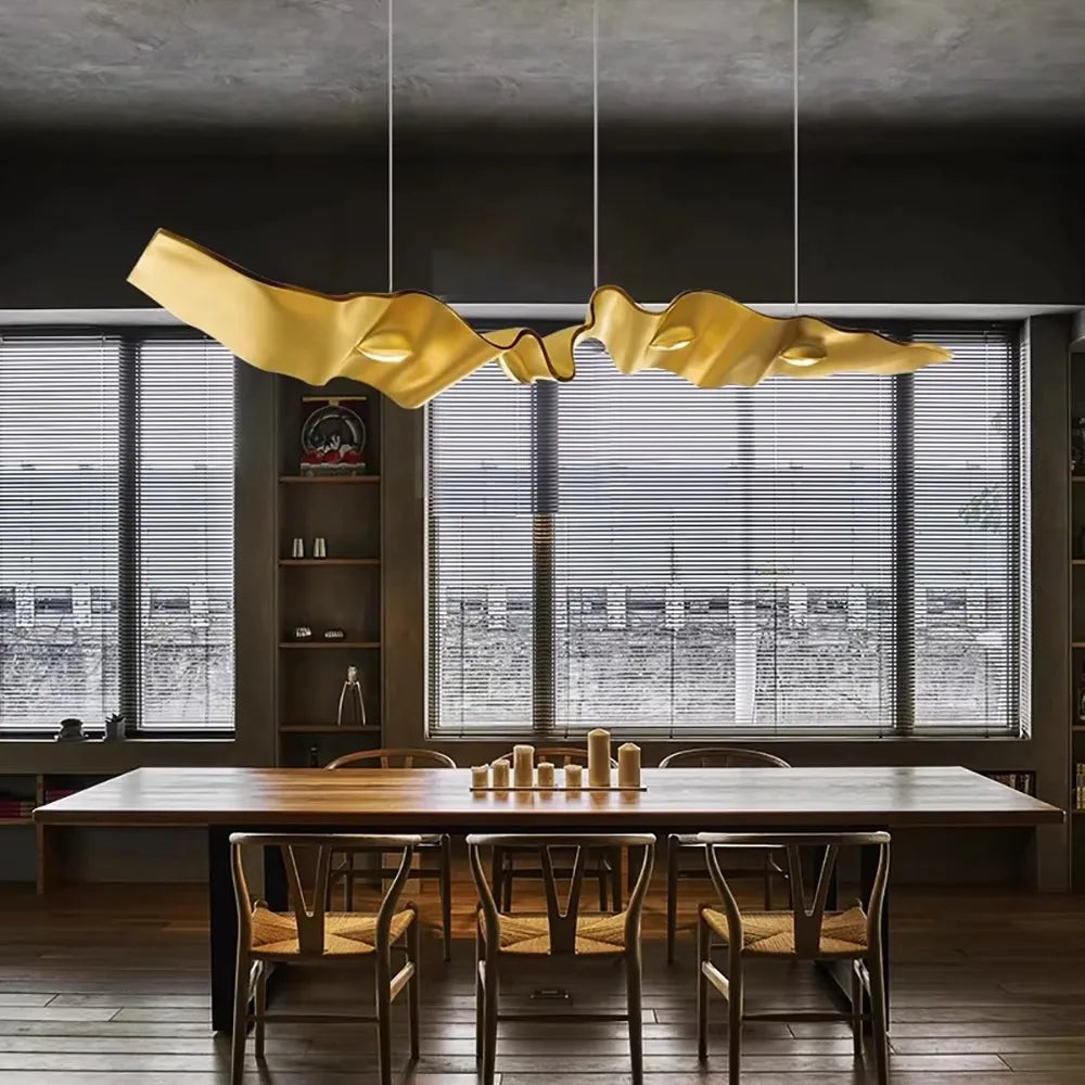 Angel eyes linear chandelier with ring lit heads on a steel bar