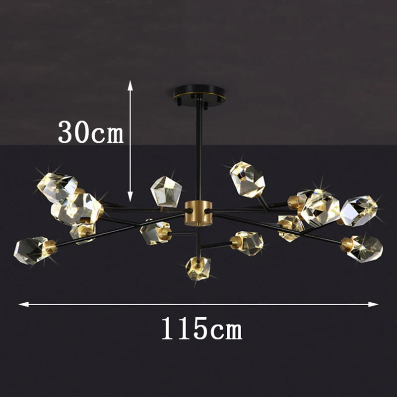 Clear faceted crystal drops hanging from the chandelier plated metal rail