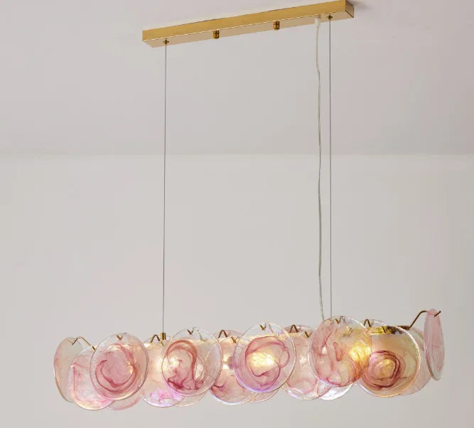 Matching pink Murano glass wall lamp on a plated iron bracket