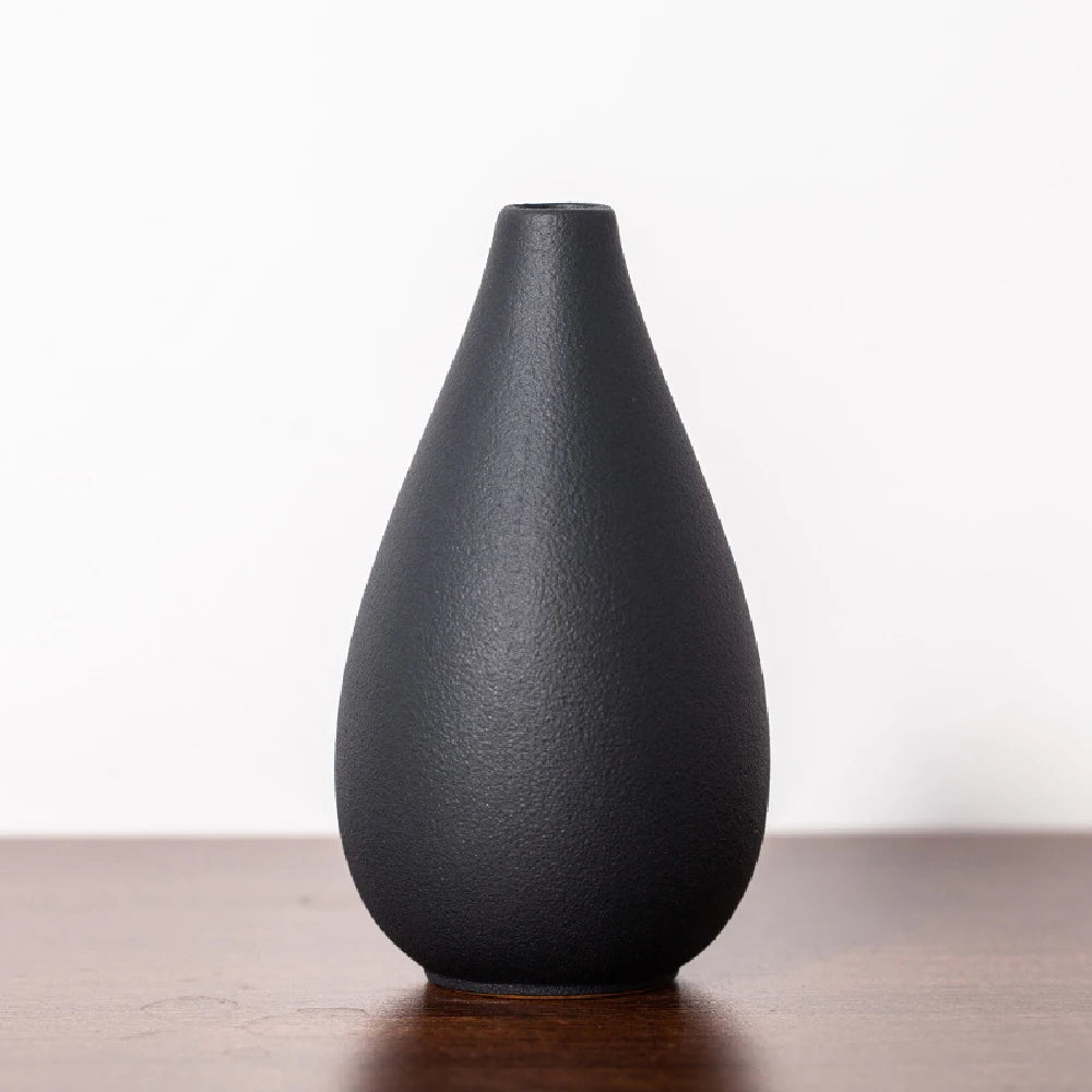 Close-up of frosted matte rim and neck of small ceramic bud vase style C detail