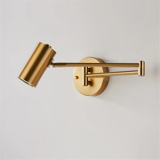 gold and black wall sconce, front view on white background