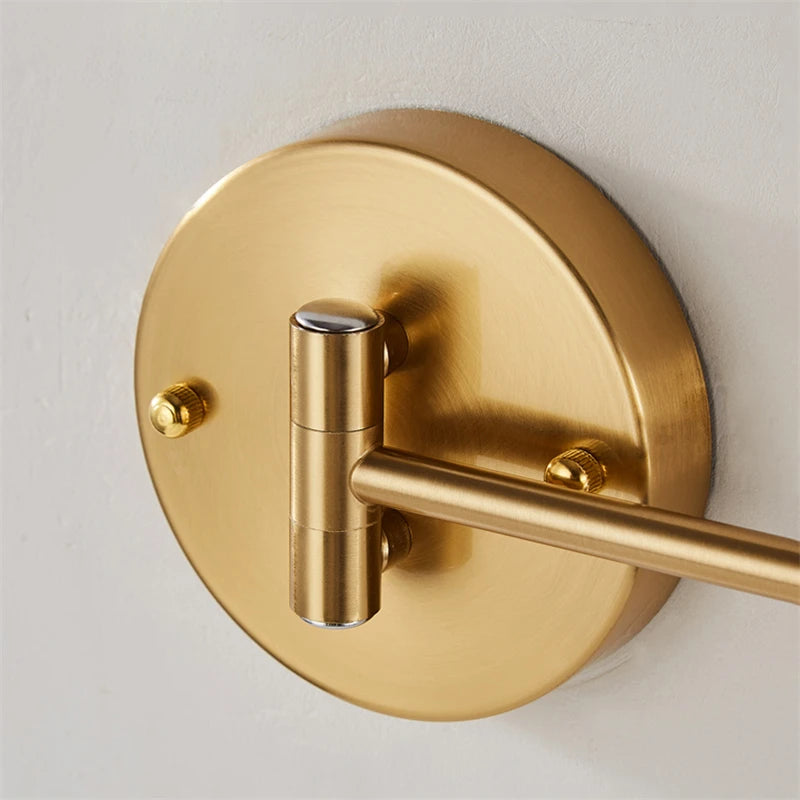gold and black wall sconce, close-up of shade and hardware detail