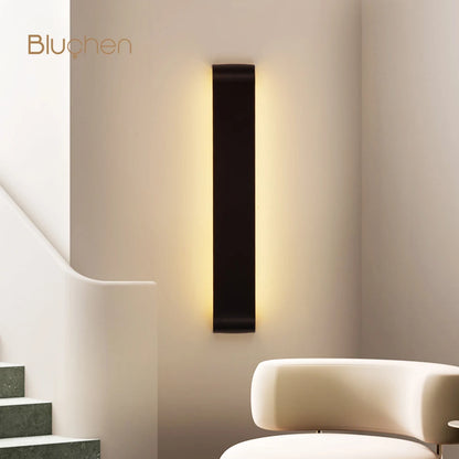 aluminum wall sconce, side profile showing mounting depth