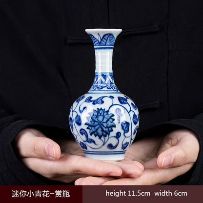 Jingdezhen blue white porcelain mini vase on wooden shelf