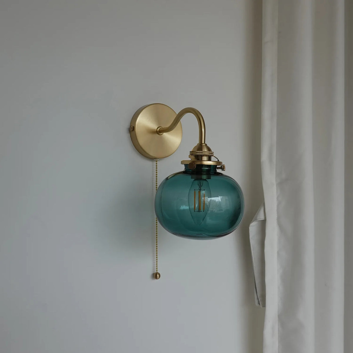 copper plug-in wall sconce, close-up of shade and hardware detail
