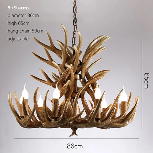 Nine arm antler chandelier with clear glass shades in warm light