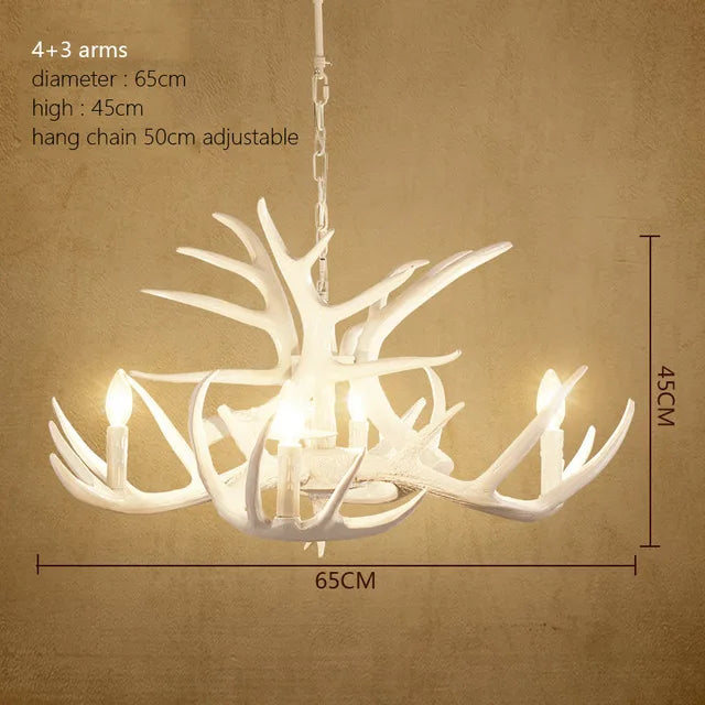 Antler chandelier with fifteen arms and nine clear glass shades
