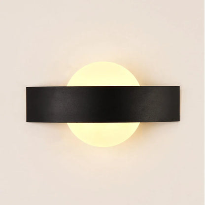 black wall sconce, close-up of shade and hardware detail