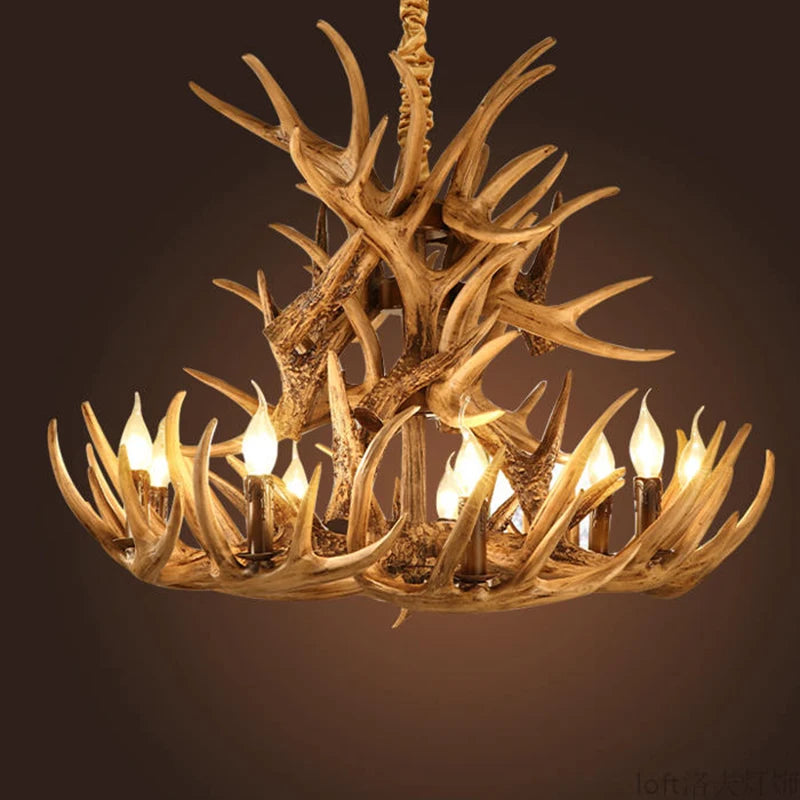 Rustic antler wood chandelier with clear glass shades on branching arms