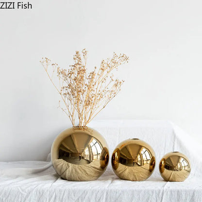 Gold ceramic ball vase small size on console table