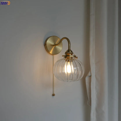 copper plug-in wall sconce, front view on white background