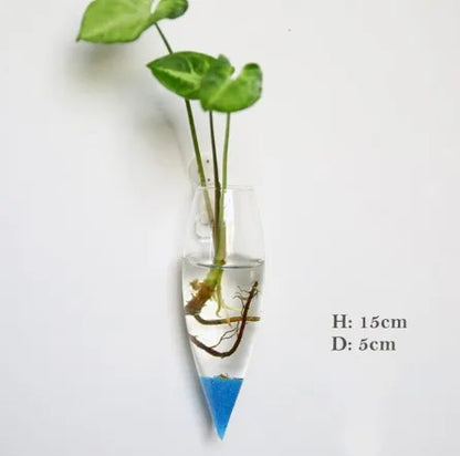 Geometric glass wall vase with flower stems modern home