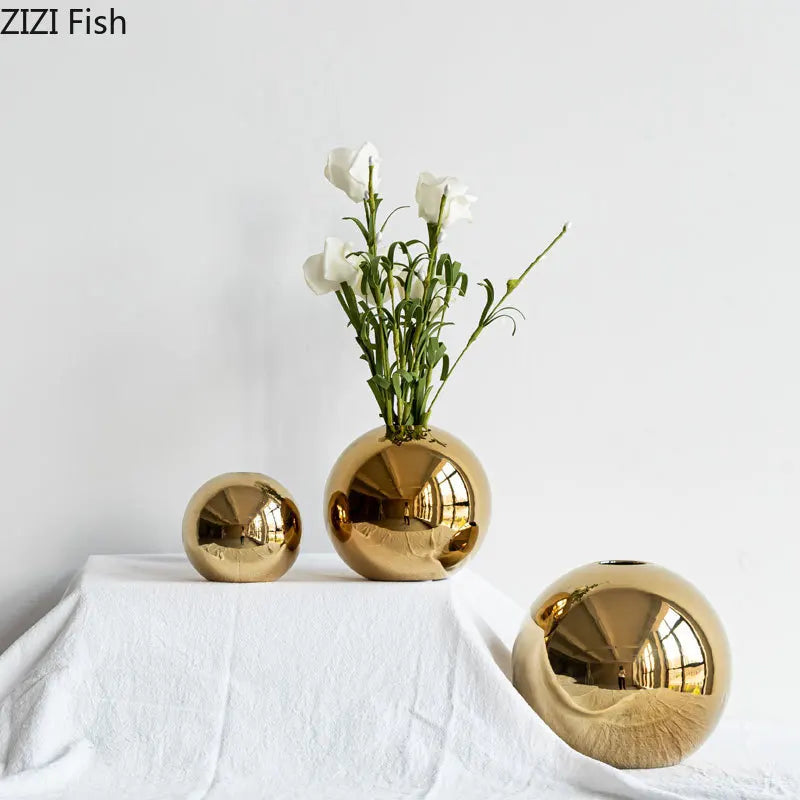 Three gold ball ceramic vases small medium large together