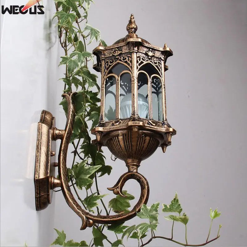 outdoor wall sconce, detail view of fixture base and arm