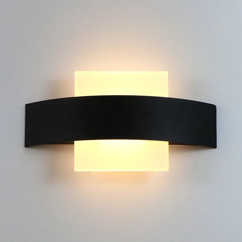 black wall sconce, front view on white background