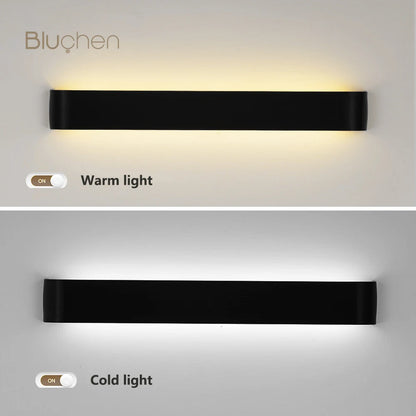 aluminum wall sconce, installed in a room interior setting