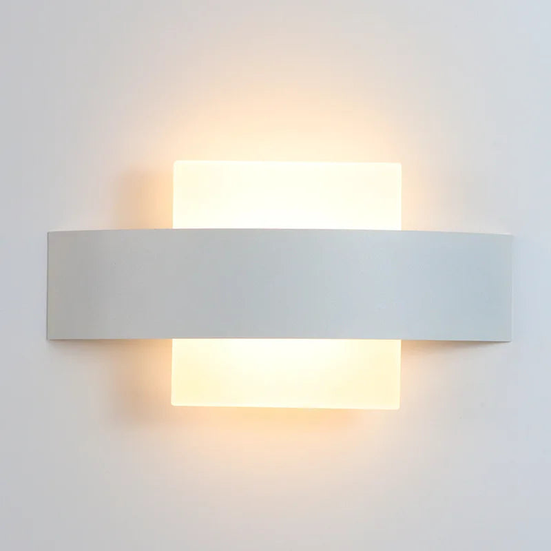 black wall sconce, side profile showing mounting depth