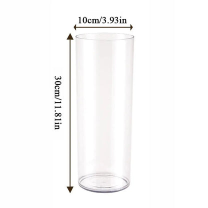 Small and large clear cylinder vases grouped on event banquet table display