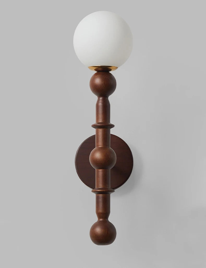 glass wall sconce, detail view of fixture base and arm