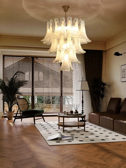 Cloudy white glass shades set like petals on a chrome steel frame