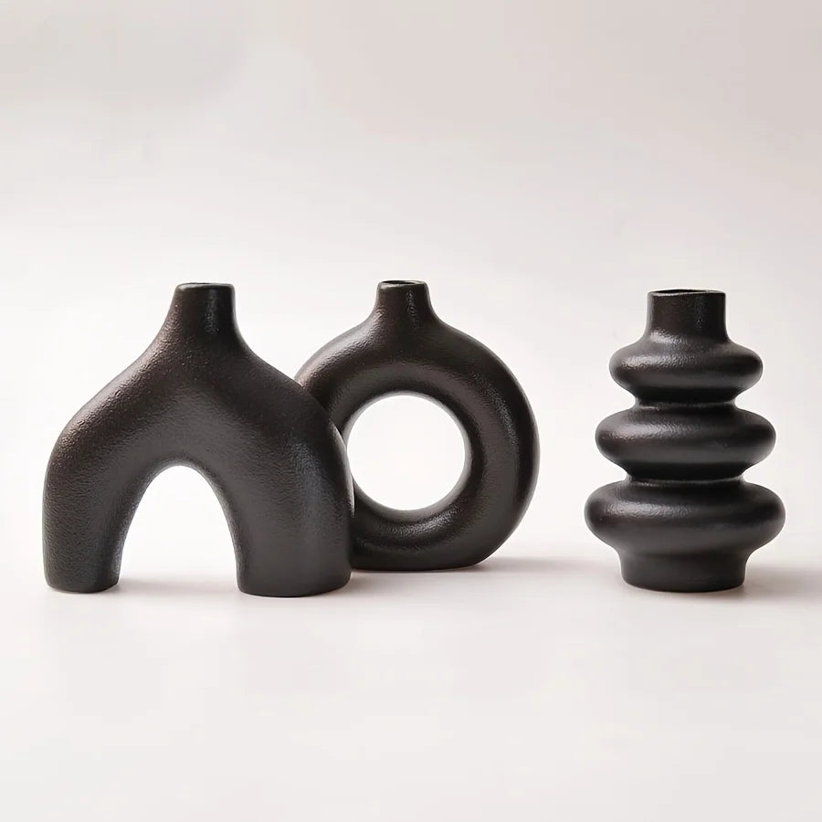 Bohemian ceramic vase set styled on a coffee table as a living room centrepiece