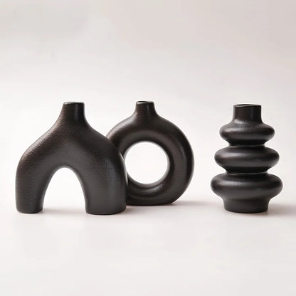 Bohemian ceramic vase set styled on a coffee table as a living room centrepiece