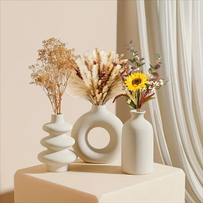 Bohemian ceramic trio vase set in matte black on minimalist shelf