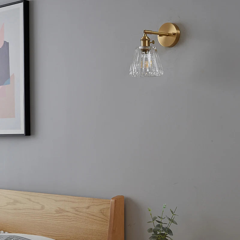 brass bathroom wall sconce, side profile showing mounting depth