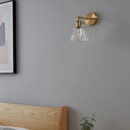 brass bathroom wall sconce, side profile showing mounting depth