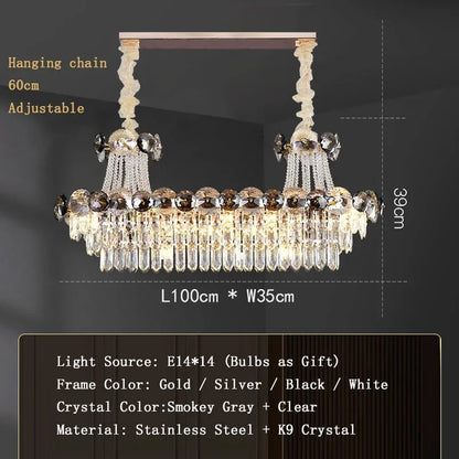 Classical gold crystal chandelier shown lit in warm white light