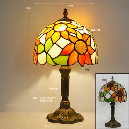 European Tiffany lamp casting soft coloured light reflected on wall