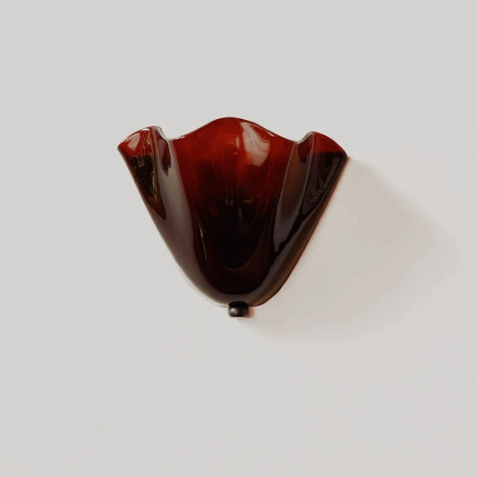 glass wall sconce, front view on white background